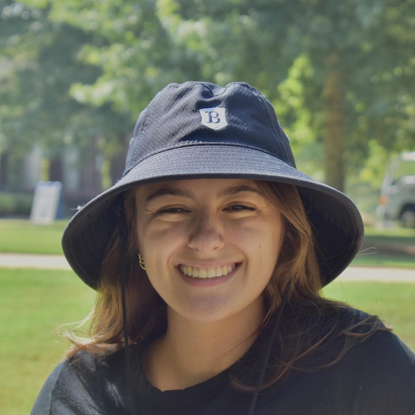 New Era Navy Bucket Hat with shield