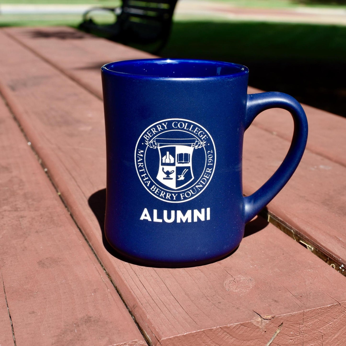 Blue mug with Berry College Seal above "Alumni"