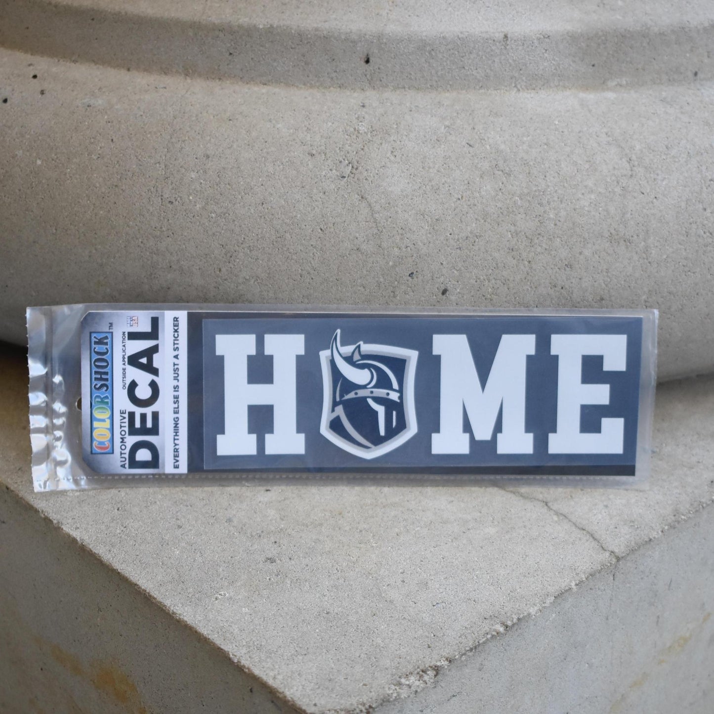 Car decal that says "HOME" with a Viking logo