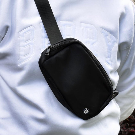 Black crossbody bag with Berry shield logo